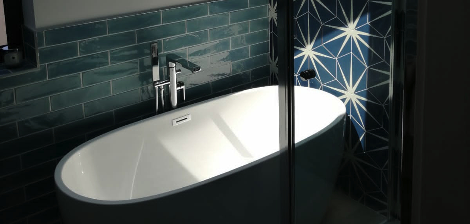 Header image with blue bathroom star tiles
